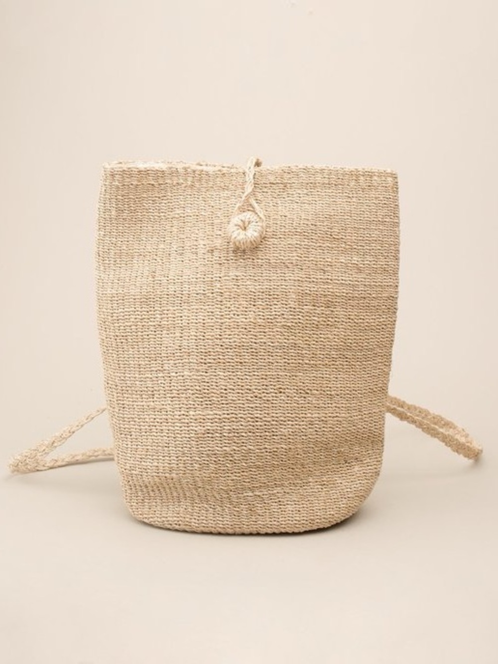 ABACÁ - Woven Straw Bucket Backpack in Natural